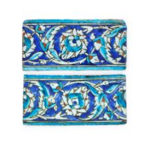 A PAIR OF IZNIK BLUE BORDER TILES, OTTOMAN, TURKEY, 17TH/18TH CENTURY