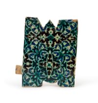 A BLUE & BLACK DECORATED TIMURID TILE, 14TH CENTURY, PERSIA