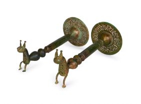 A PAIR OF GHAZNAVID BRONZE OPENWORK ZOOMORPHIC BRONZE DOOR HANDLES, 12TH CENTURY