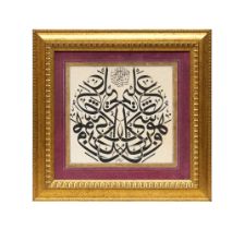 A FRAMED ARABIC CALLIGRAPHY VERSE SIGNED BY ABU ALMAKARIM