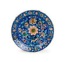 A LARGE 'KUBACHI' POTTERY DISH SAFAVID NORTH WEST IRAN, EARLY 17TH CENTURY