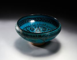 A RAQQA COBALT BLUE GLAZED POTTERY BOWL, FIRST HALF 13TH CENTURY