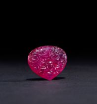 A MUGHAL CARVED RUBY GEMSTONE, CARVED IN THE FORM OF THE MUGHAL FLOWER, 19TH CENTURY, INDIA