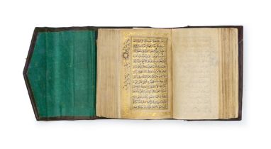 AN ILLUMINATED QURAN COPIED BY ABU TALIB TIBATI, NORTH INDIA, DATED 15TH RABI'll 1142/6th November 1