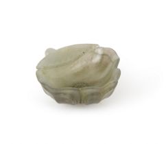 A PALE GREEN JADE MUGHAL STYLE WINE CUP IN THE FORM OF A LEAF. 19TH/20TH CENTURY