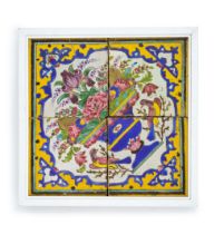 A PANEL OF FOUR CUERDA SECA POTTERY TILES, QAJAR, 19TH CENTURY