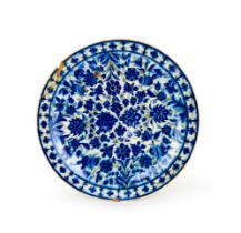 A LARGE 'KUBACHI' POTTERY DISH SAFAVID NORTH WEST IRAN, EARLY 17TH CENTURY