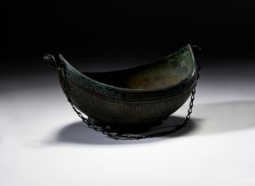 A TINNED COPPER BEGGAR'S BOWL (KASHKUL) 19TH CENTURY