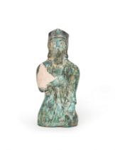 A TURQUOISE GLAZED & BLACK PAINTED POTTERY FIGURE OF A RULER, KASHAN, 12TH CENTURY, PERSIA