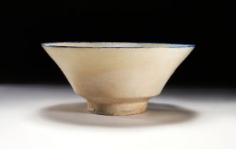A KASHAN CLEAR GLAZED POTTERY BOWL, CENTRAL IRAN, 12TH/13TH CENTURY