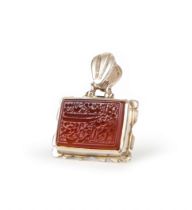 A CALLIGRAPHIC INSCRIBED AGATE PENDANT, 19TH CENTURY OR LATER, PERSIA