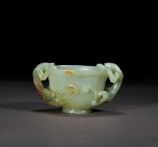 A CELADON JADE MUGHAL STYLE "CHI-DRAGON" CUP, QING DYNASTY (1644-1911)