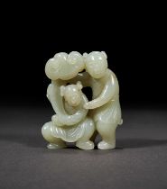 A PALE CELADON JADE CARVING OF A HEHE ERXIAN GROUP, MING-QING DYNASTY