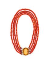 A FOUR STRAND CORAL & GEM SET NECKLACE