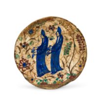 A FIGURAL QAJAR FIGURAL CIRCULAR TILE, 19TH CENTURY, PERSIA