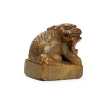 A CHINESE CARVED SOAPSTONE SEAL IN THE FORM OF A QILIN, QING DYNASTY (1644-1911)