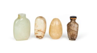 FOUR CHINESE CARVED JADE SNUFF BOTTLES, QING DYNASTY (1644-1911)