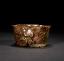 A MOTTLED JADE LOTUS LEAF & FROG BRUSH WASHER, QING DYNASTY (1644-1911)