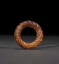 A JADE ROPE TWIST RING, HAN DYNASTY