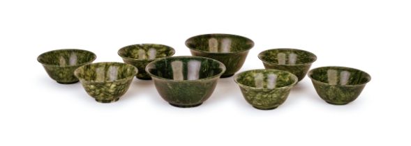 EIGHT CHINESE SPINACH JADE BOWLS, QING DYNASTY (1644-1911)