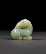 A CELADON JADE FIGURE OF A RECUMBENT RAM, 19TH/20TH CENTURY