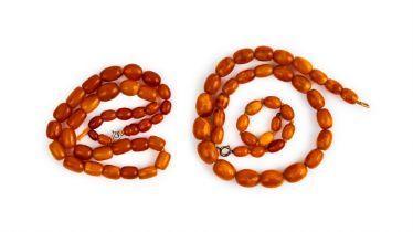 TWO STRAND OF AMBER BEADS, 19TH CENTURY AND LATER