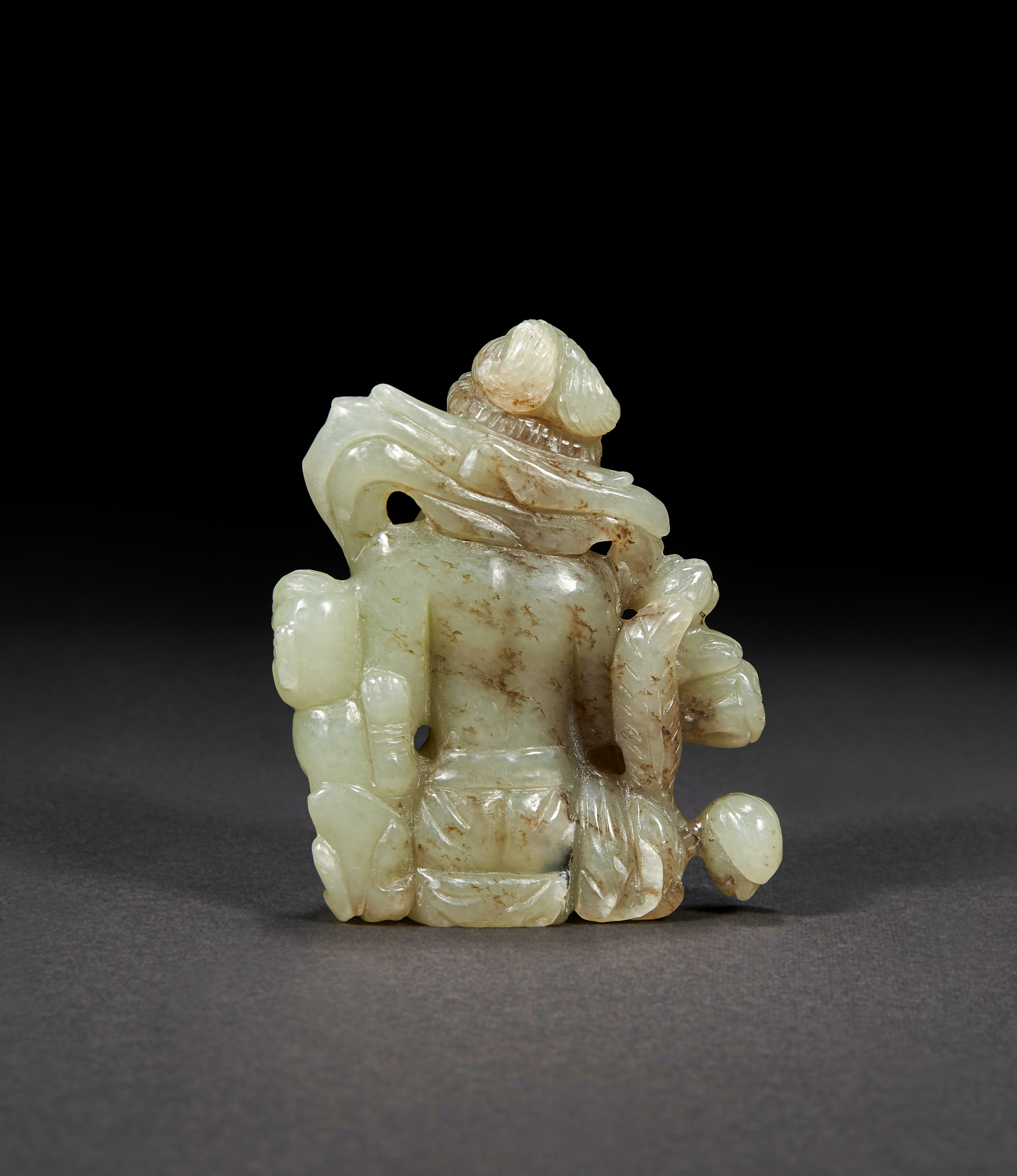 A PALE CELADON JADE CARVING OF A DHARMAPALA, QING DYNASTY (1644-1911) - Image 3 of 3