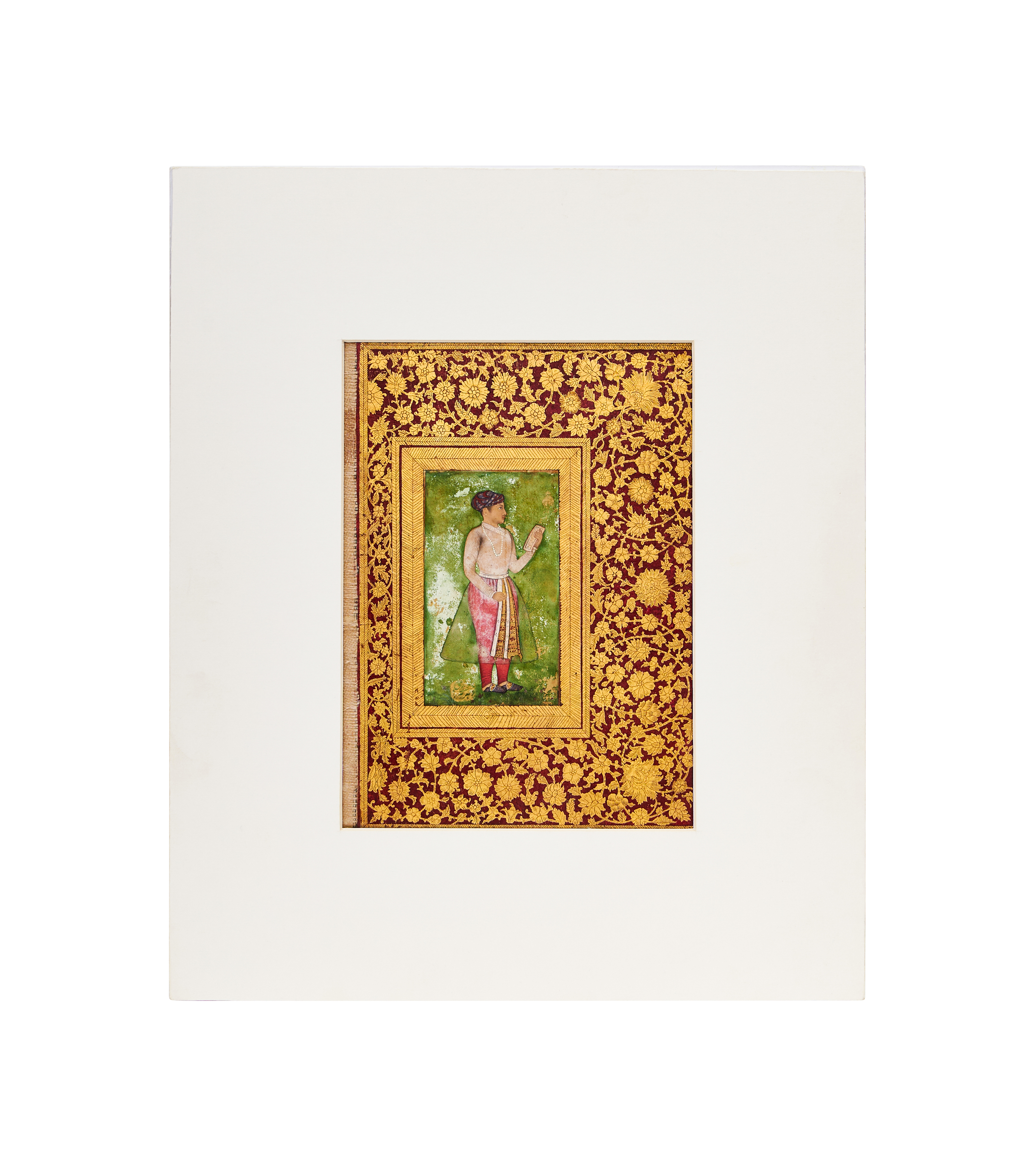 ATTRIBUTED TO THE MUGHAL MASTER MANOHAR, A PORTRAIT OF A PRINCE, MOUNTED ON A ROYAL ALBUM PAGE,INDIA - Image 2 of 4