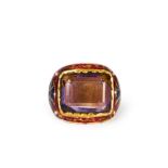 A MUGHAL CARVED AMETHYST GEM SET ENAMEL & GOLD RING,19TH CENTURY OR LATER