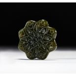 A MUGHAL SPINACH JADE STAR SHAPED PENDANT, 19TH CENTURY