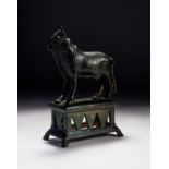 A BRONZE FIGURE OF A BULL, PROBABLY ROMAN