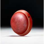 AN AGATE RED "EYE" DZI BEAD