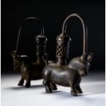 A PAIR OF BRONZE BULL HANDLED INCENSE BURNERS, PROBABLY KHORASSAN, OR LATER