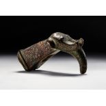 A BRONZE INSCRIBED HAMMER HEAD IN THE FORM OF AN ELEPHANT, PROBABLY 12TH/13TH CENTURY