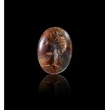 AN EASTERN ROMAN AGATE INTAGLIO OF A RULER