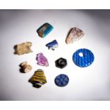 AN ASSORTMENT OF SEMI PRECIOUS STONE & GLASS EGYPTIAN AMUMLETS THIRD INTERMEDIATE -LATE PERIOD, CIRC