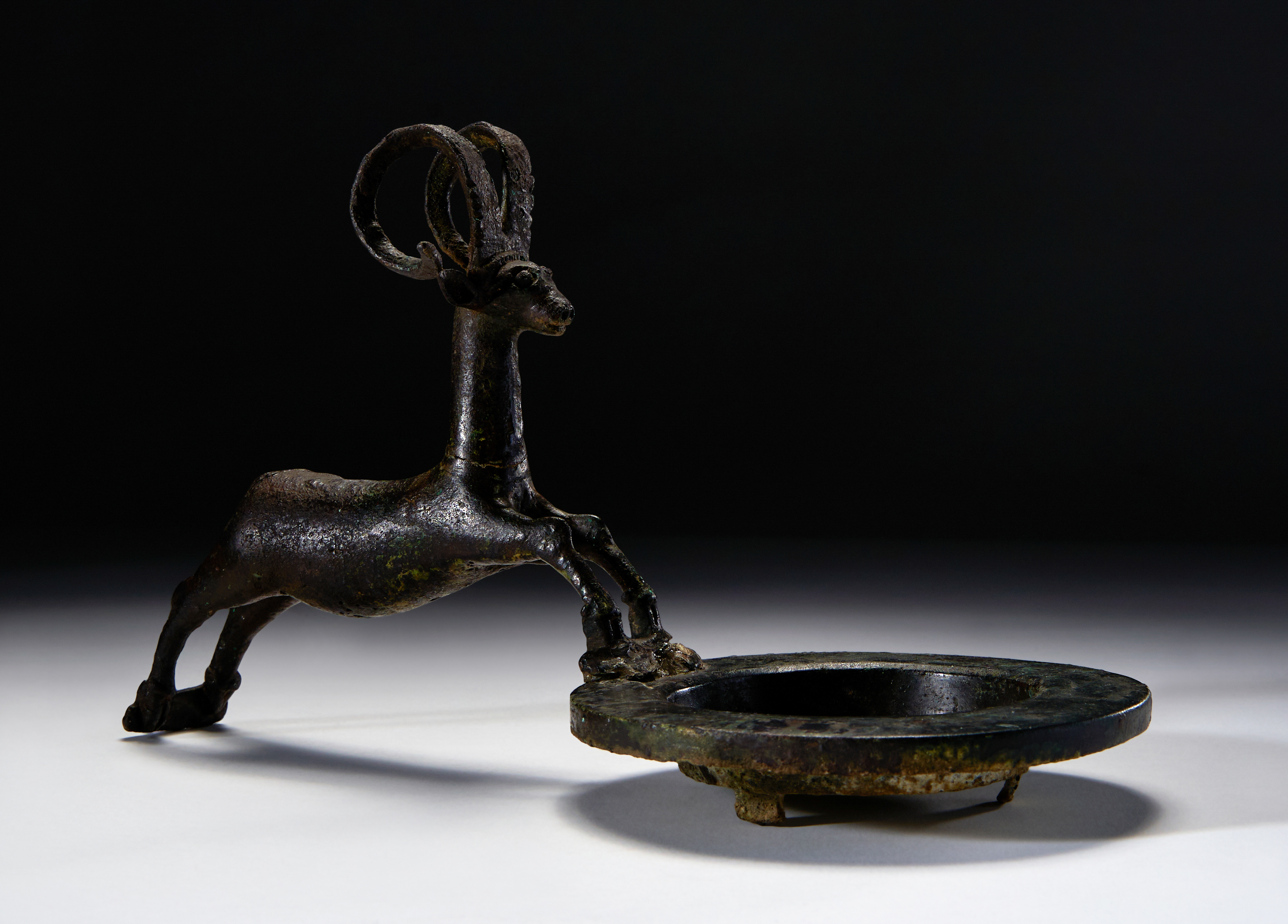 A BRONZE PLATE WITH AN IBEX - Image 3 of 3