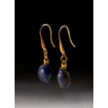 A PAIR OF EGYPTIAN GOLD & LAPIS LAZULI EARRINGS NEW KINGDOM, DYNASTY XVIII, 1550-1307 B.C.