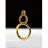 A BYZANTINE GOLD RING WITH A ROUND HOOP AND A HIGH BEZEL, CIRCA 5TH CENTURY A.D.