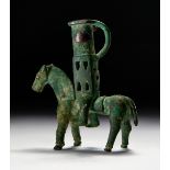 A GREEK BRONZE HORSE GEOMETRIC PERIOD, CIRCA 8TH CENTURY B.C.