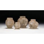 FOUR ROMAN ROCK CRYSTAL MINIATURE JARS, CIRCA 2ND CENTURY A.D. AND LATER