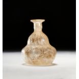 A ROMAN COLOURLESS GLASS JAR, CIRCA EARLY 3RD CENTURY A.D.
