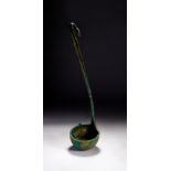 A BRONZE KYATHOS (LADLE) WITH ANIMAL HEAD TERMINAL 5TH-6TH CENTURY C.E.