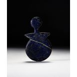 A LAPIS LAZULI IDOL, POSSIBLY ANATOLIA CIRCA 2700-2100 B.C. OR LATER