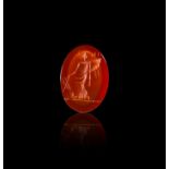 A CARNELIAN INTAGLIO OF A MAIDEN PICKING WHEAT
