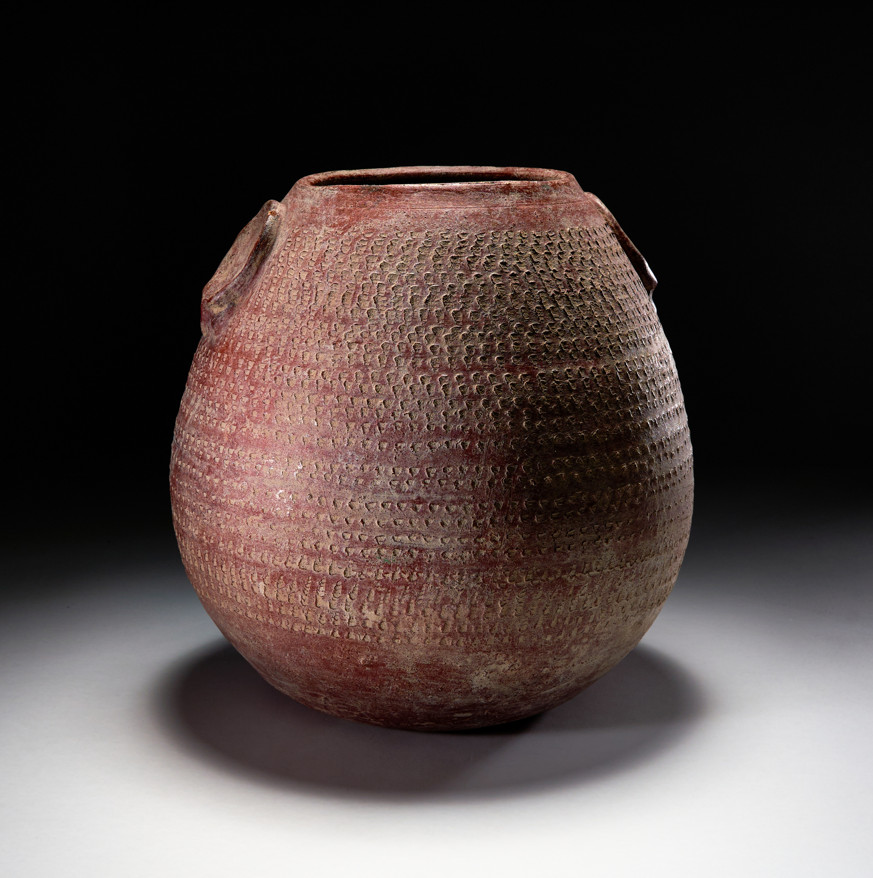 A LARGE POTTERY STORAGE JAR, PROBABLY NEOLITHIC PERIOD