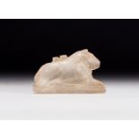 A ROMAN ROCK CRYSTAL AMULET OF A SEATED LION, CIRCA 1ST CENTURY A.D.