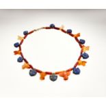 AN EGYPTIAN LAPIS LAZULI, ROCK CRYSTAL, AGATE & CARNELIAN BEAD NECKLACE LATE PERIOD TO PTOLEMAIC PER