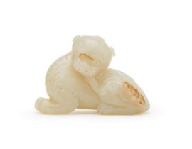 A CHINESE WHITE JADE FIGURE OF A MYTHICAL BEAST, 18TH CENTURY, QING DYNASTY (1644-1911)