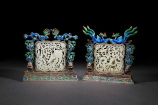 A PAIR OF DRAGON & PHOENIX WHITE JADE PLAQUES IN SILVER & ENAMEL FRAMES, 19TH CENTURY